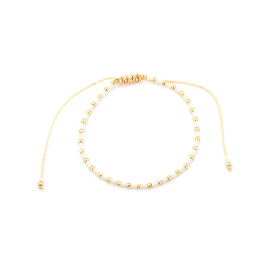 Pulsera acabado oro amarillo de 18k y Resina Crema - Uky