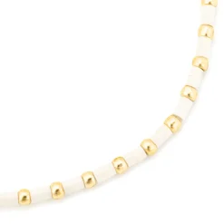 Pulsera acabado oro amarillo de 18k y Resina Crema - Uky