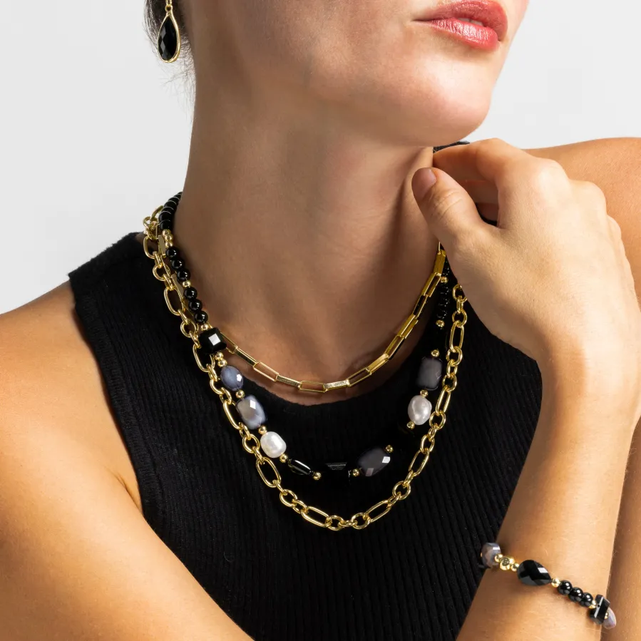 Pulsera con Resina Negra acabado oro 18k - Nyste